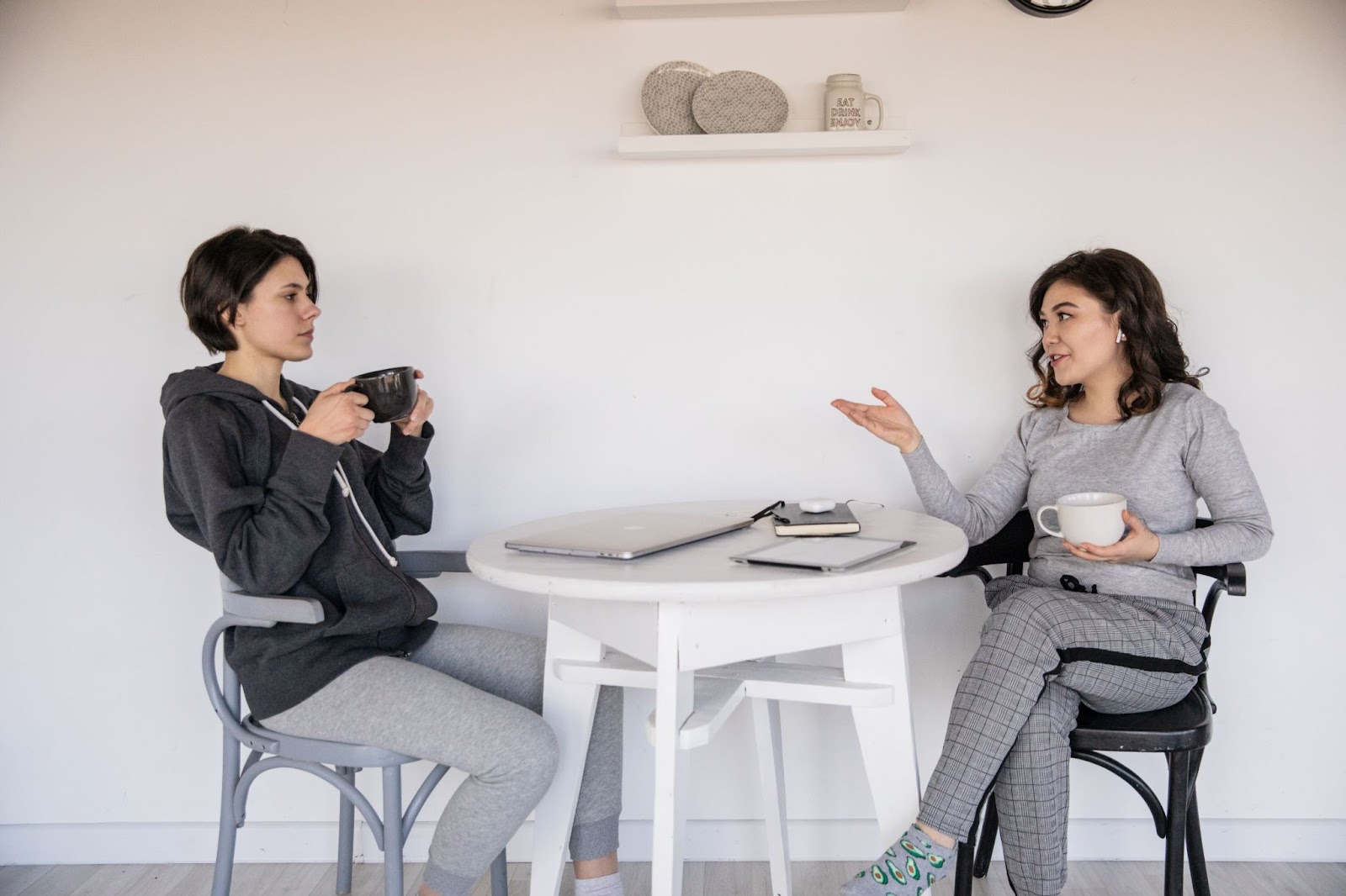 Two girls having a coffee chat