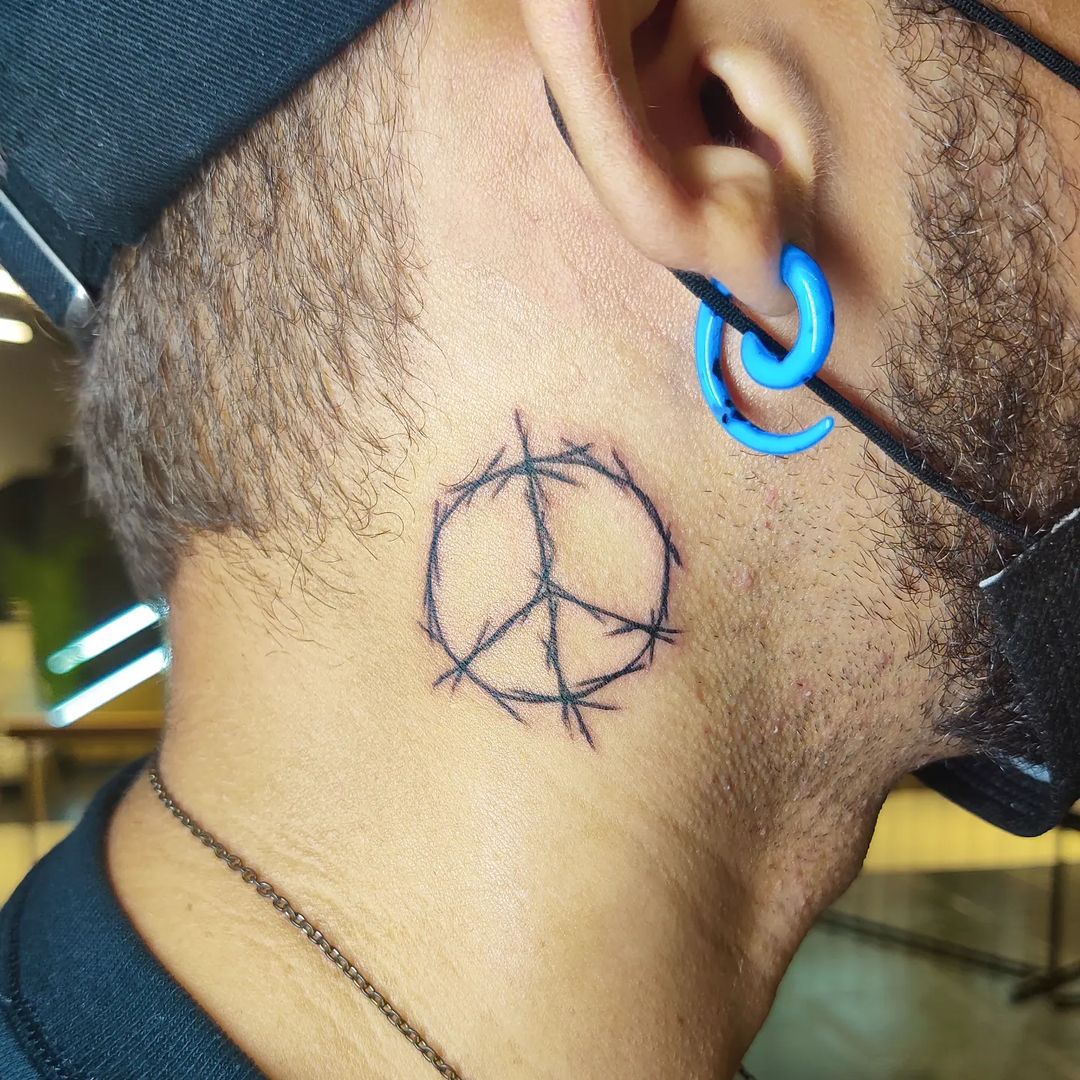 Outlined Peace Tattoo