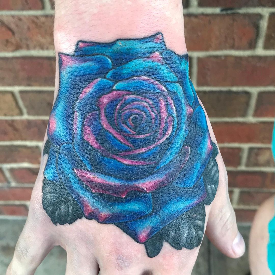 blue hand rose tattoo