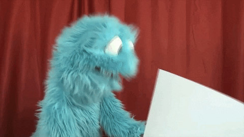 A muppet reading from a piece of paper, 