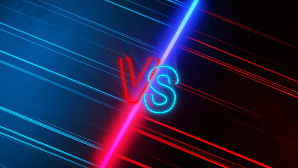 VS written in blue and red neon lights 
