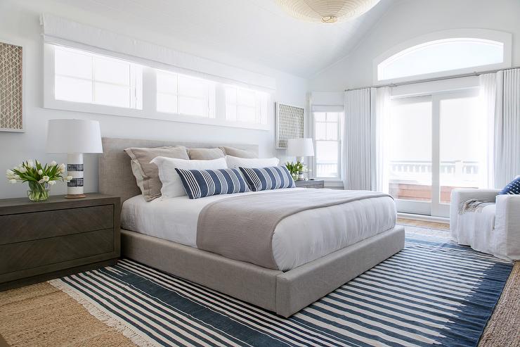 A simple rug or carpet can make it easy to move a heavy platform bed over a flat hardwood floor.
