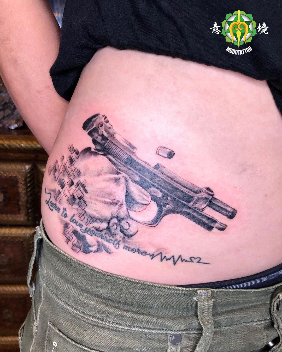 Firing Gun Tattoo Design