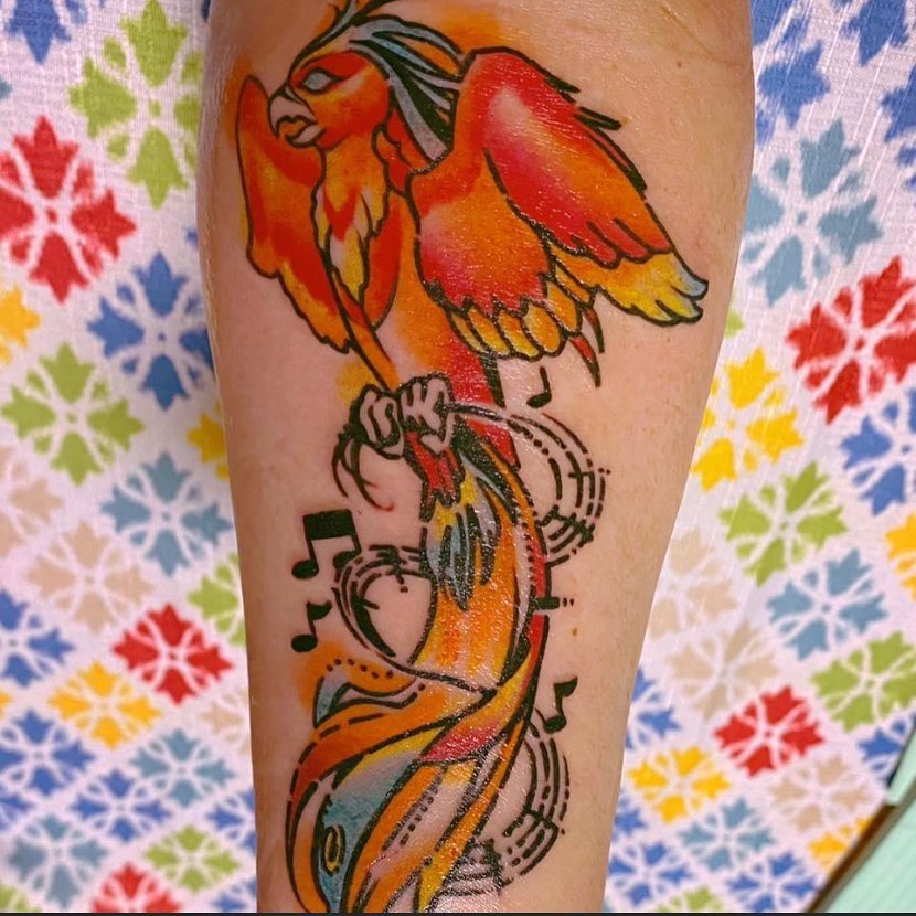 Phoenix With Musical Symbol Tattoo