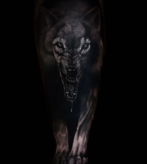 Dark Black Wolf Tattoo on Forearm