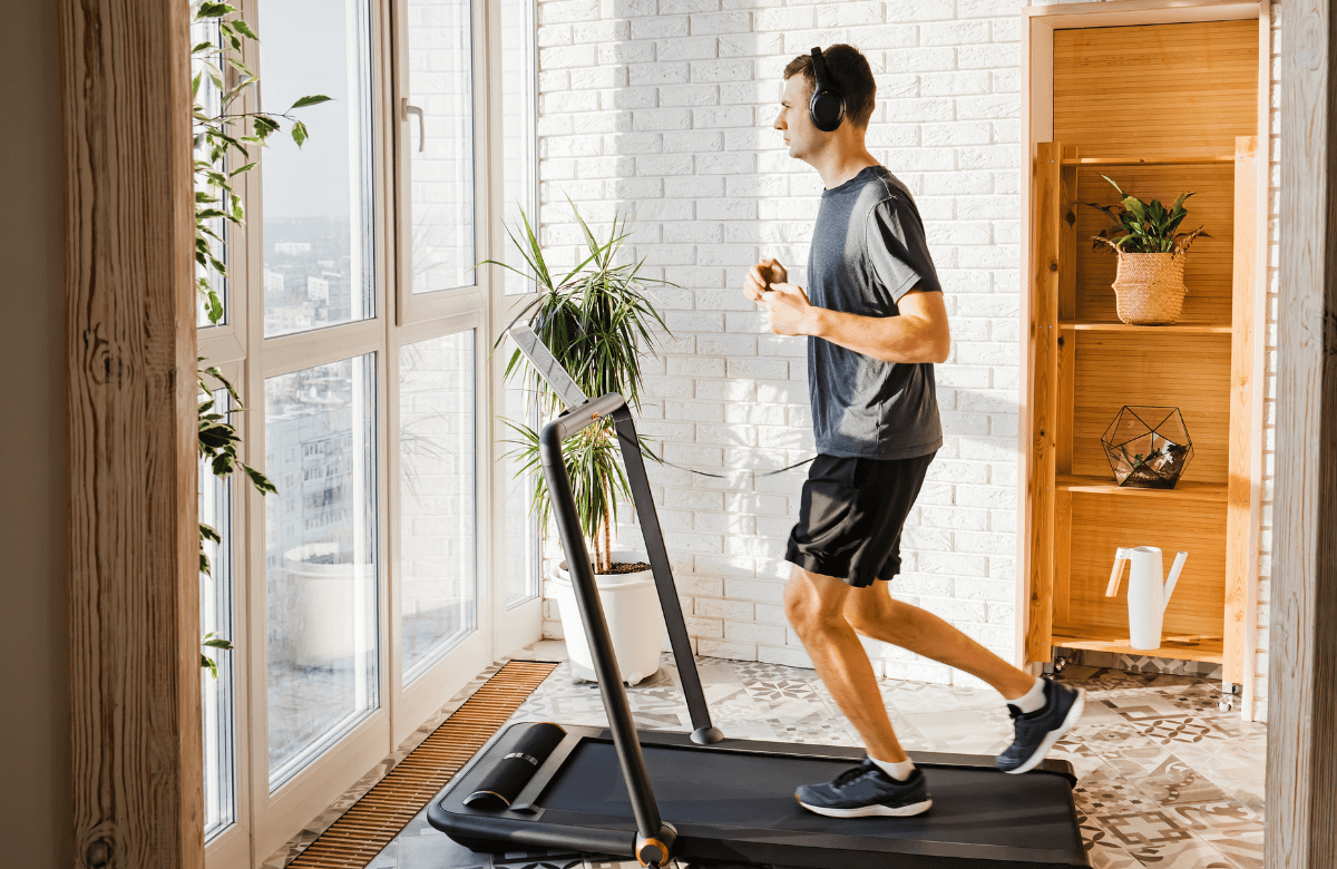 A man running on the best treadmill at home