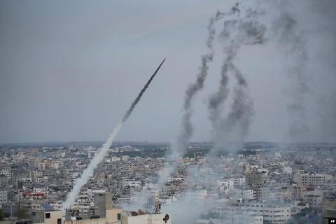 Rockets are launched by Palestinian militants from the Gaza Strip towards Israel, Oct. 7, 2023.&nbsp;