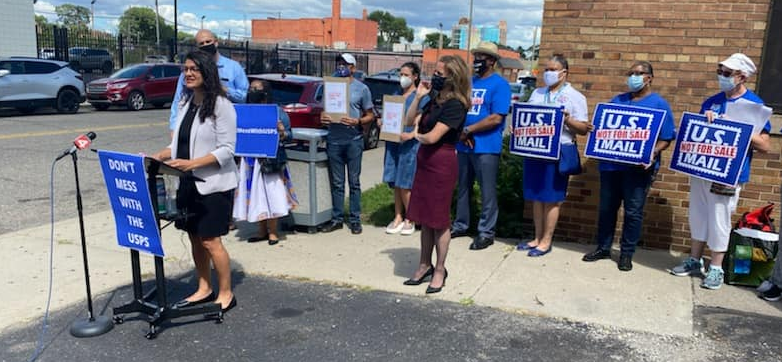 Image of Rashida at a Don't Mess With the USPS rally