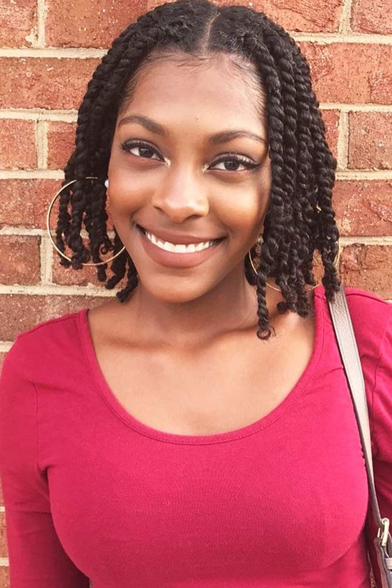 a lady wearing natural twists for styling natural short hair