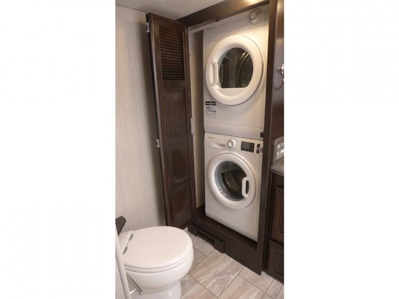 This luxurious bathroom features a washer and dryer, so it’s easy to avoid the campground laundromat.