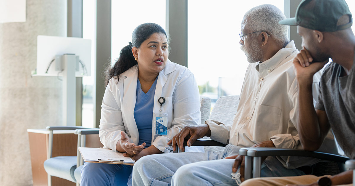 Senior man talking with doctor