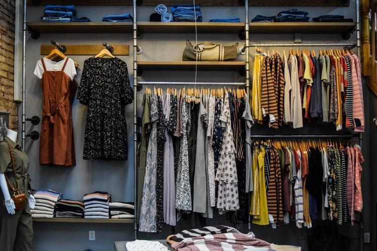 a display of assorted women's apparel in a shop 
