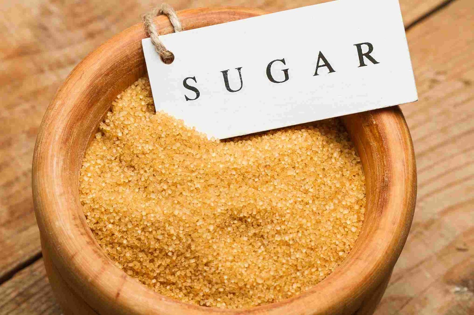 A bowl of brown sugar

Description automatically generated