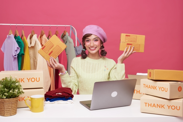 fashion-clothing-with-parcel-box-computer-laptop