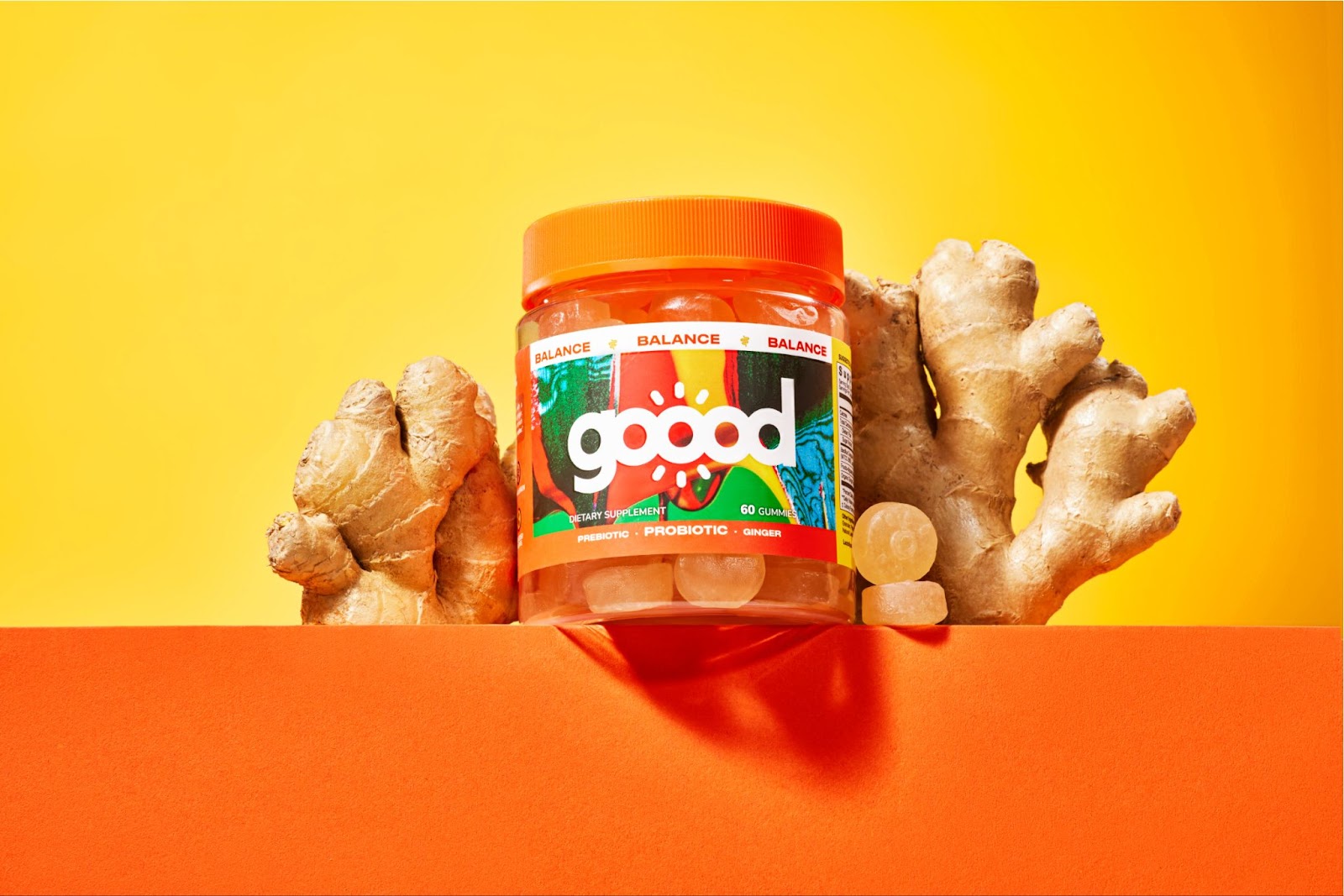 Packaging design for Goood Wellness featuring real flowers, fruits and botanicals dripping with color 