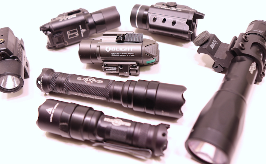 The Olight Baldr Pro surrounded by its peers.