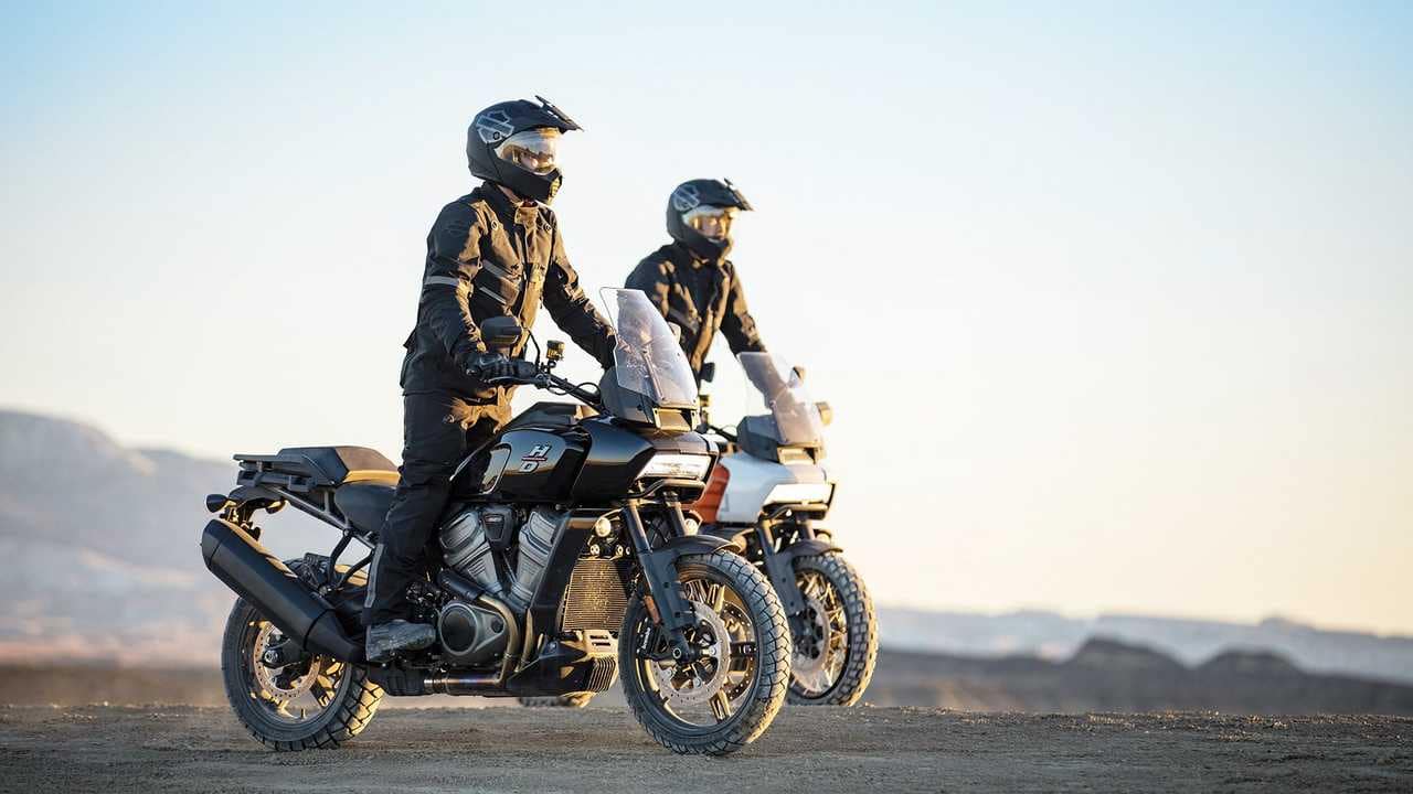 Harley Davidson Pan America riders on dirt road - adventure with friends and iconic style