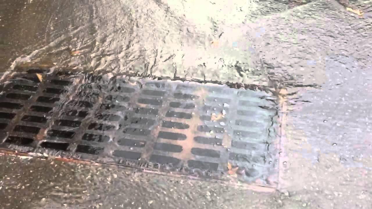 Image result for picture of overflowing street drain