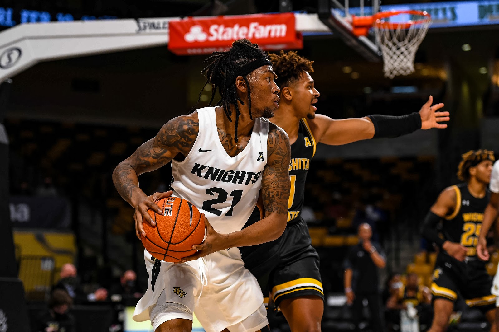 UCF sophomore forward C.J. Walker (21) was responsible for 7 points in the Knights’ 61-60 loss to the Wichita State Shockers at Addition Financial Arena on Wednesday. Photo Courtesy of UCF Athletics. 