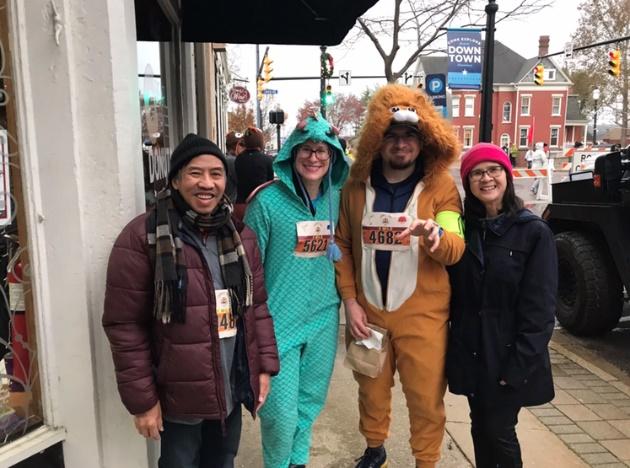 A group of people posing for a photo

Description automatically generated with medium confidence