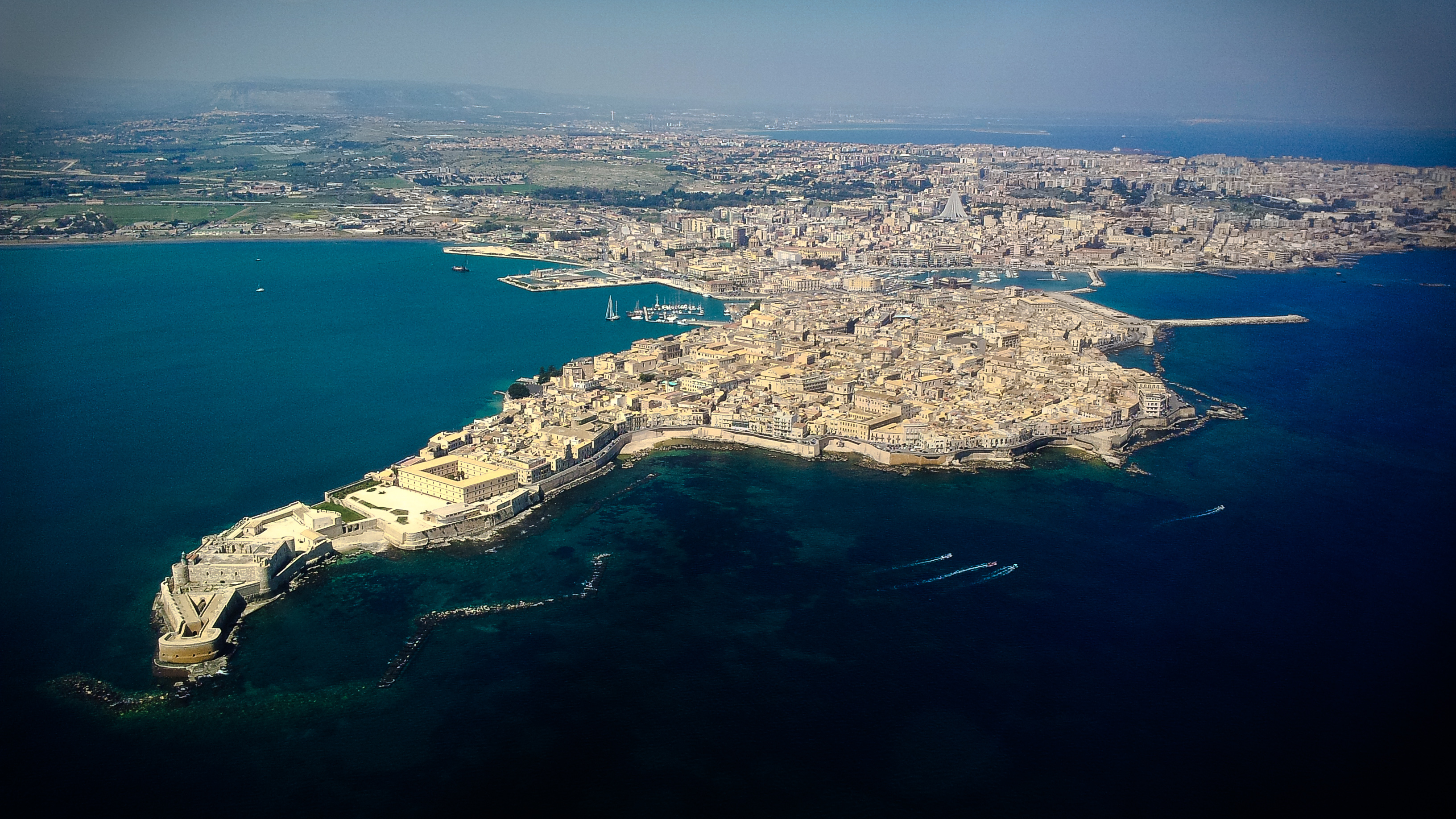 The island of Ortygia, where Syracuse was founded, is at the front of the picture