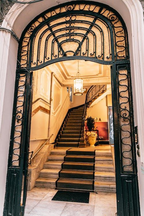 Free Grand mansion staircase near ornamental entrance Stock Photo