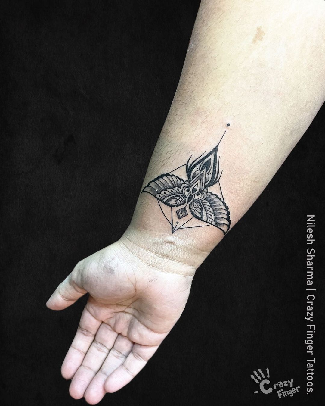 Geometric Phoenix Wings Tattoo