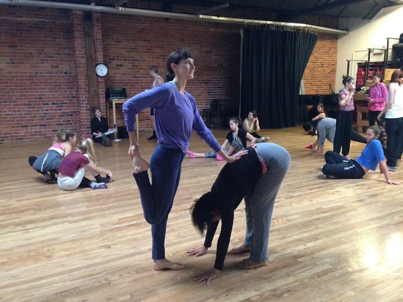 Photo: Gabi and Kristel warming up for "contemporary movement research" at Velocity in a room filled with teenage girls from Utah. Class was actually pretty fun! We did a lot of bouncing.