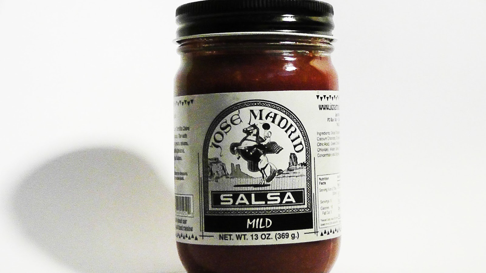 Jar of Jose Madrid mild salsa 13 ounce black and white label