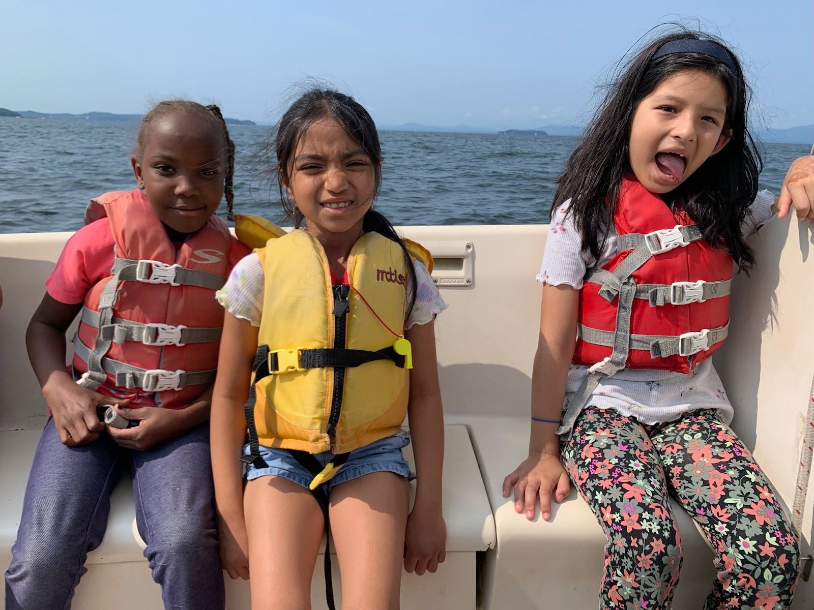 three students on a boat!