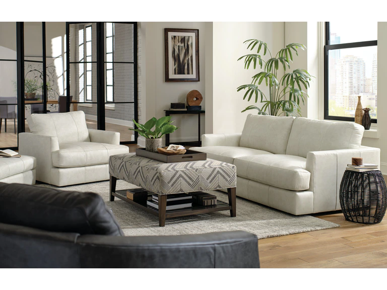 Living room furniture with upholstered sofa; Michael Gainey Signature designs custom sofa
