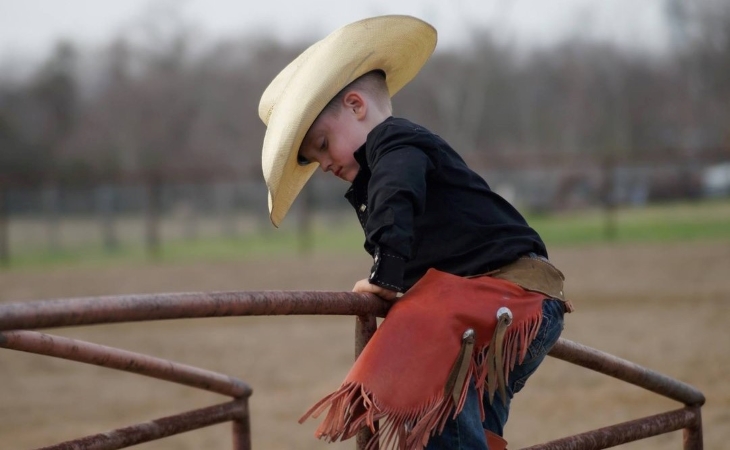 Young cowboy at the Pasadena Livestock Show & Rodeo in Pasadena, TX.