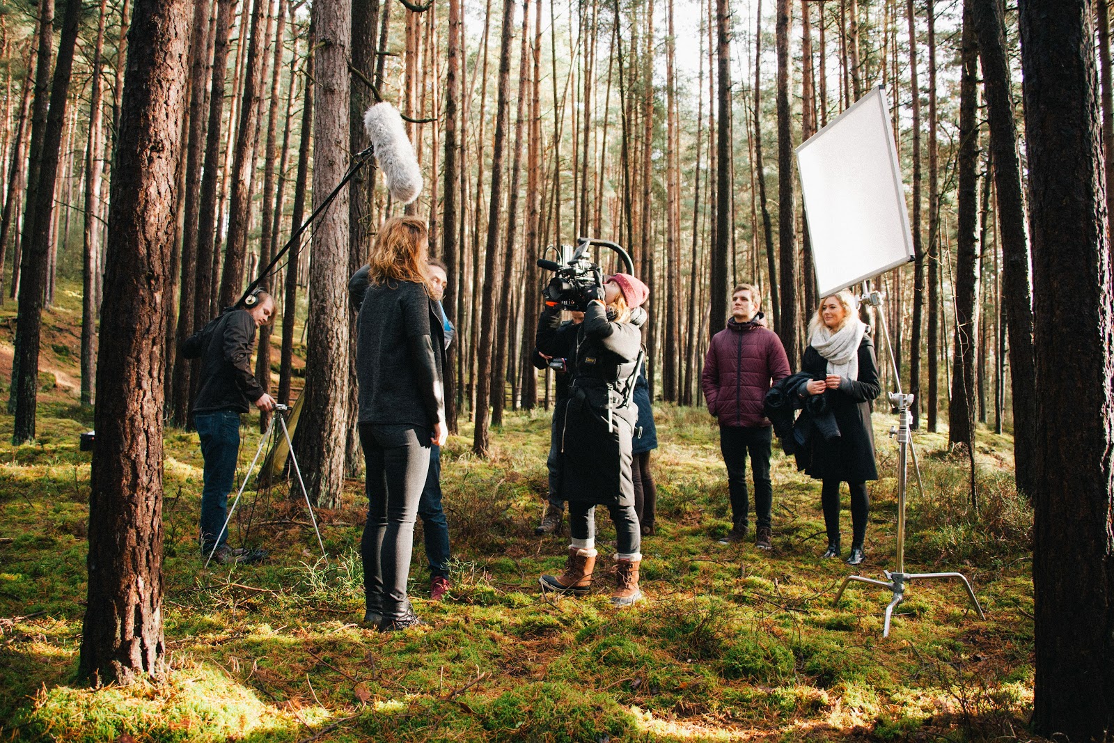 A picture of film crew shooting a documentary. When hiring a film crew, you need production insurance to protect your crew from injury and your equipment from damage and loss.