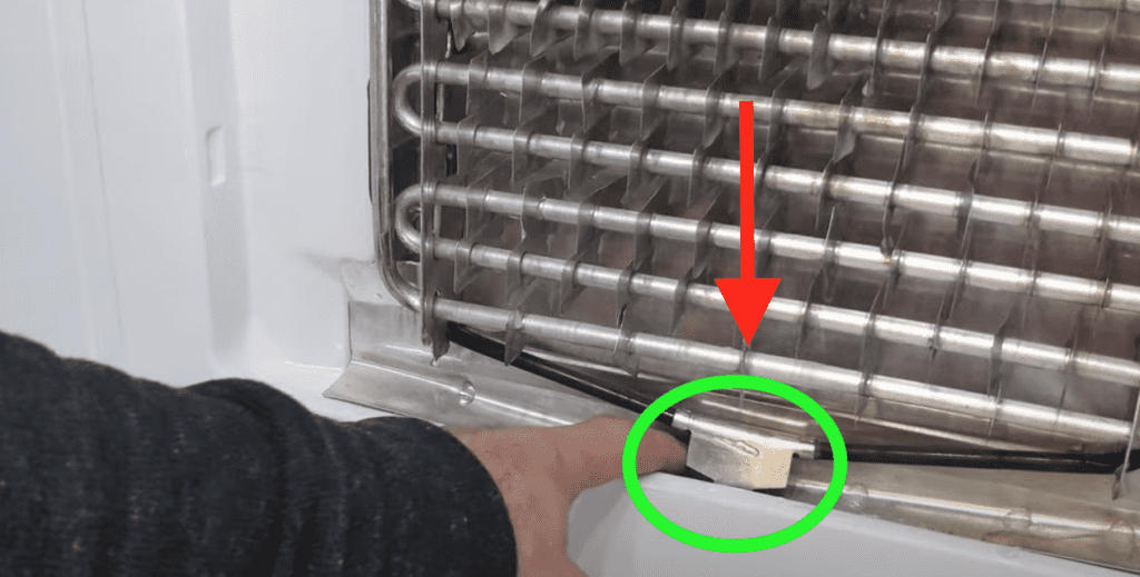 refrigerator defrost drain on dual evaporator appliance with heating element
