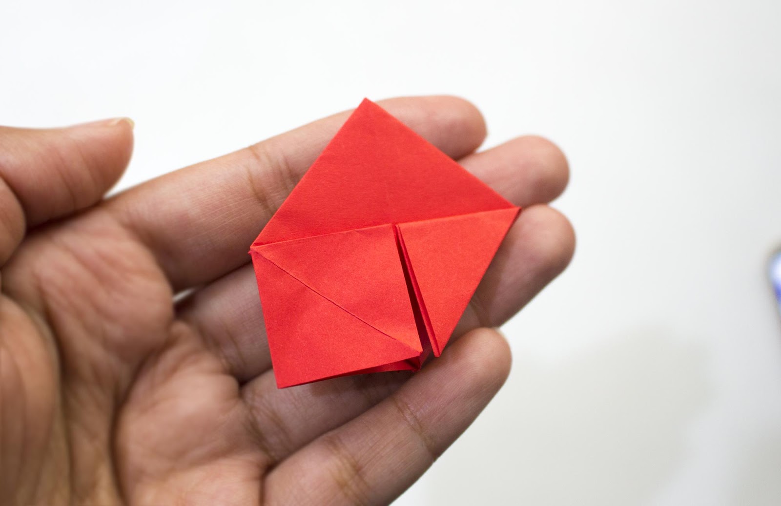 Red paper in the shape of a house
