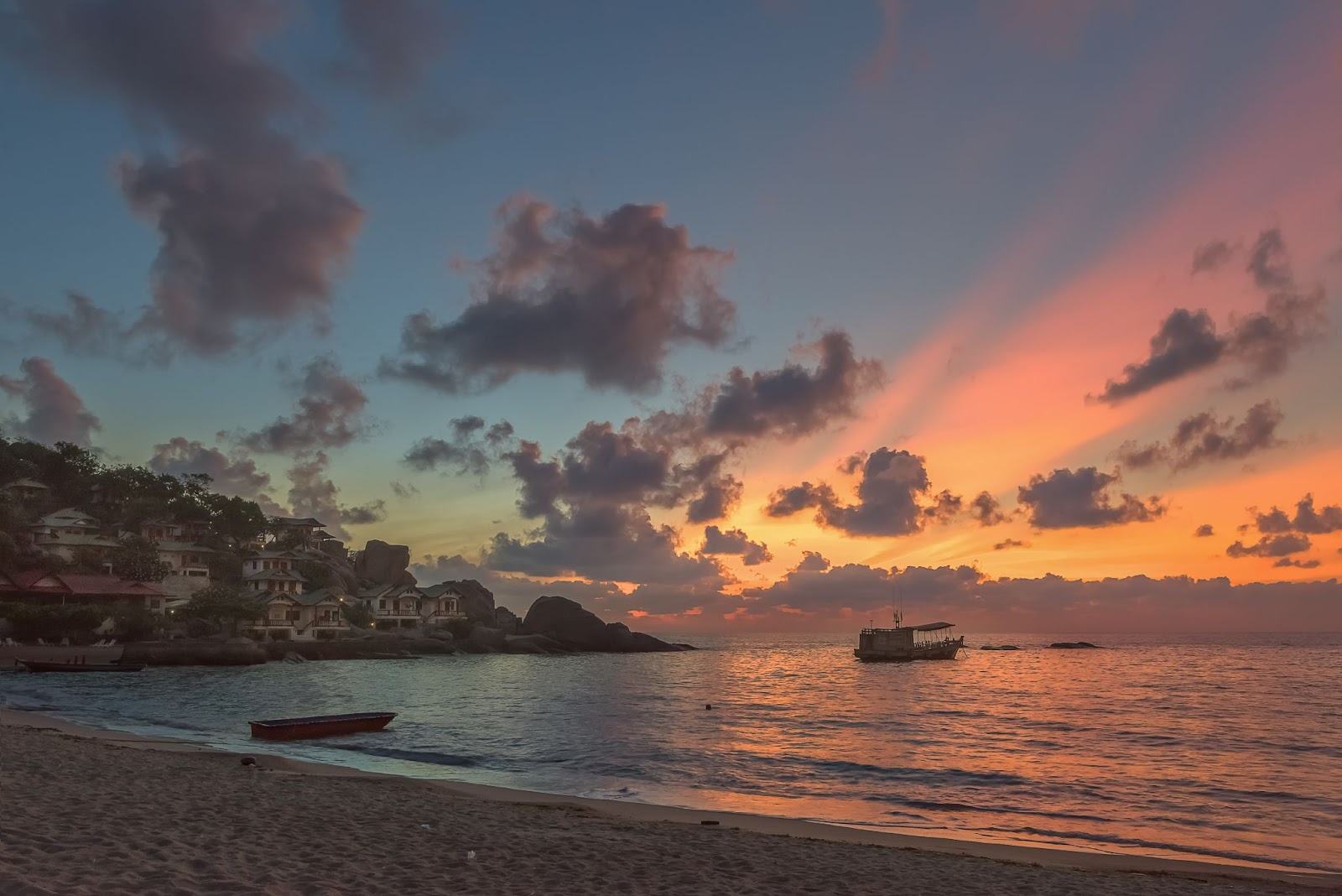 two boats sailing during sunset