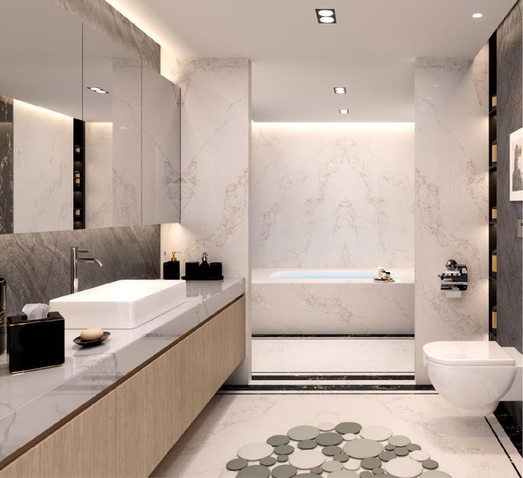 Ốp đá đồng bộ giữa trần, tường, kệ khiến cho không gian phòng tắm thêm sang trọng.