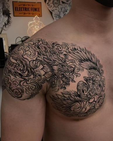 Dragon & Phoenix Chest Tattoo