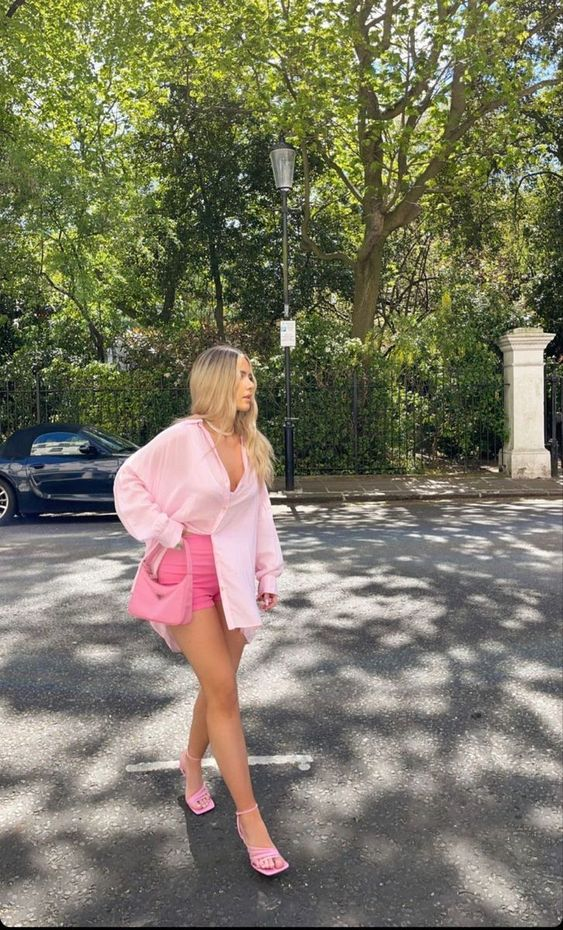 a lady wearing different shades of pink  outfit