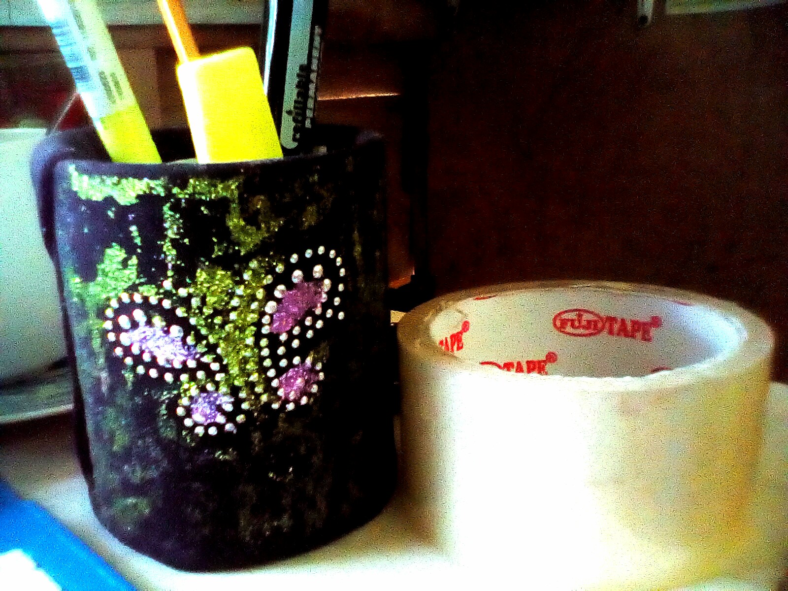 A pen vase made of recycled materials.
