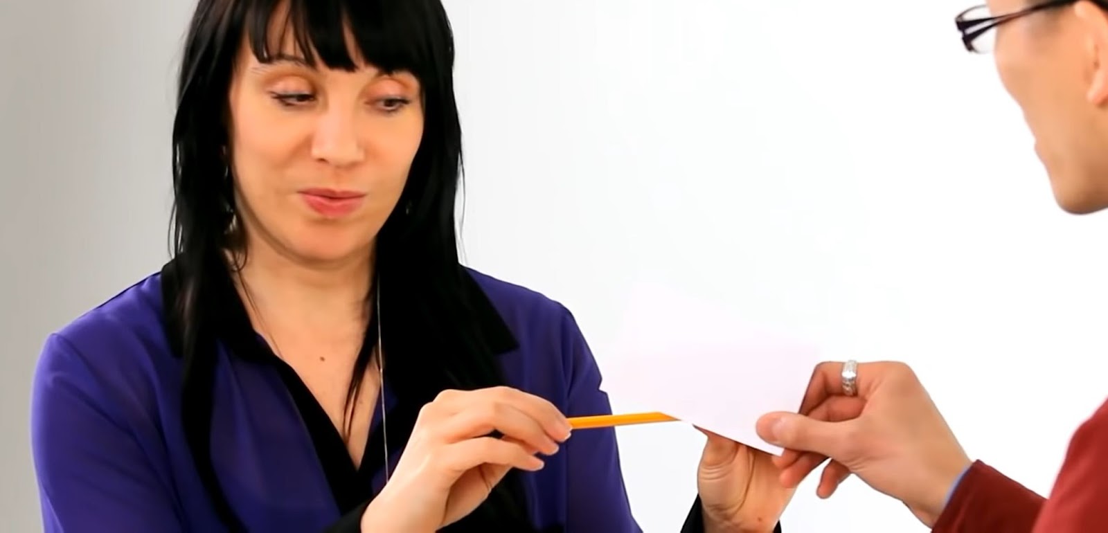 Breaking a pencil with paper trick 