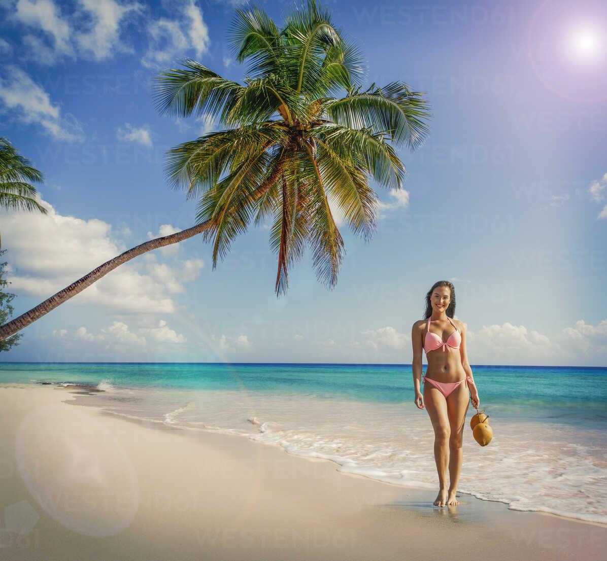 D:\Documenti\posts\posts\Miami\foto\donne normali\portrait-of-young-woman-wearing-bikini-standing-on-miami-beach-florida-usa-ISF06662.jpg