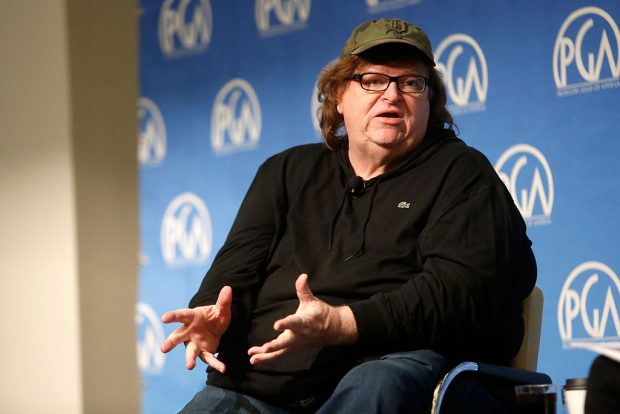 NEW YORK, NY - OCTOBER 24: Michael Moore speaks during the PGA Produced By: New York Conference at Time Warner Center on October 24, 2015 in New York City. (Photo by Thos Robinson/Getty Images for Producers Guild of America)