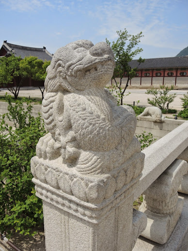 a stone statue of a dragon