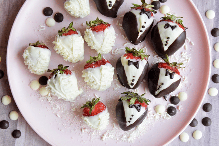 photo of bride and groom chocolate-covered strawberries