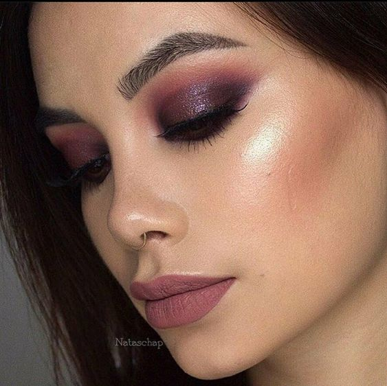 Close up view of a lady rocking the gorgeous plum eyeshadow look