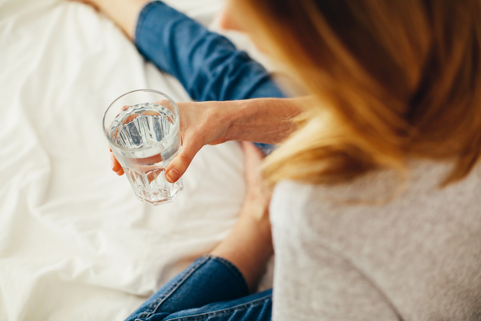 Gut cleanse: a woman drinking water