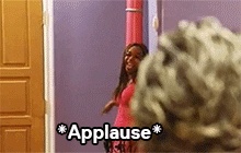 animated gif of flavor of love's new york in red dress with white text that reads applause