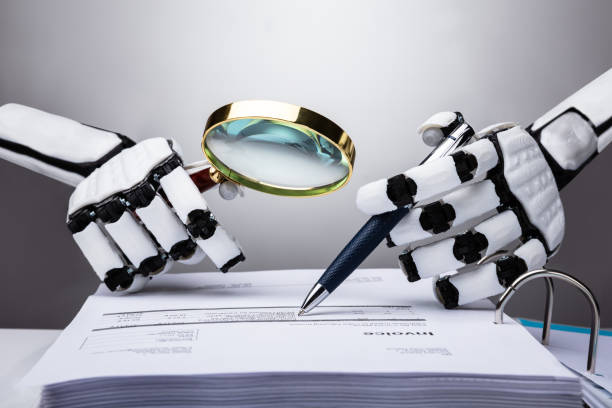 A robot scanning details on paper using a magnifying glass and a ballpen