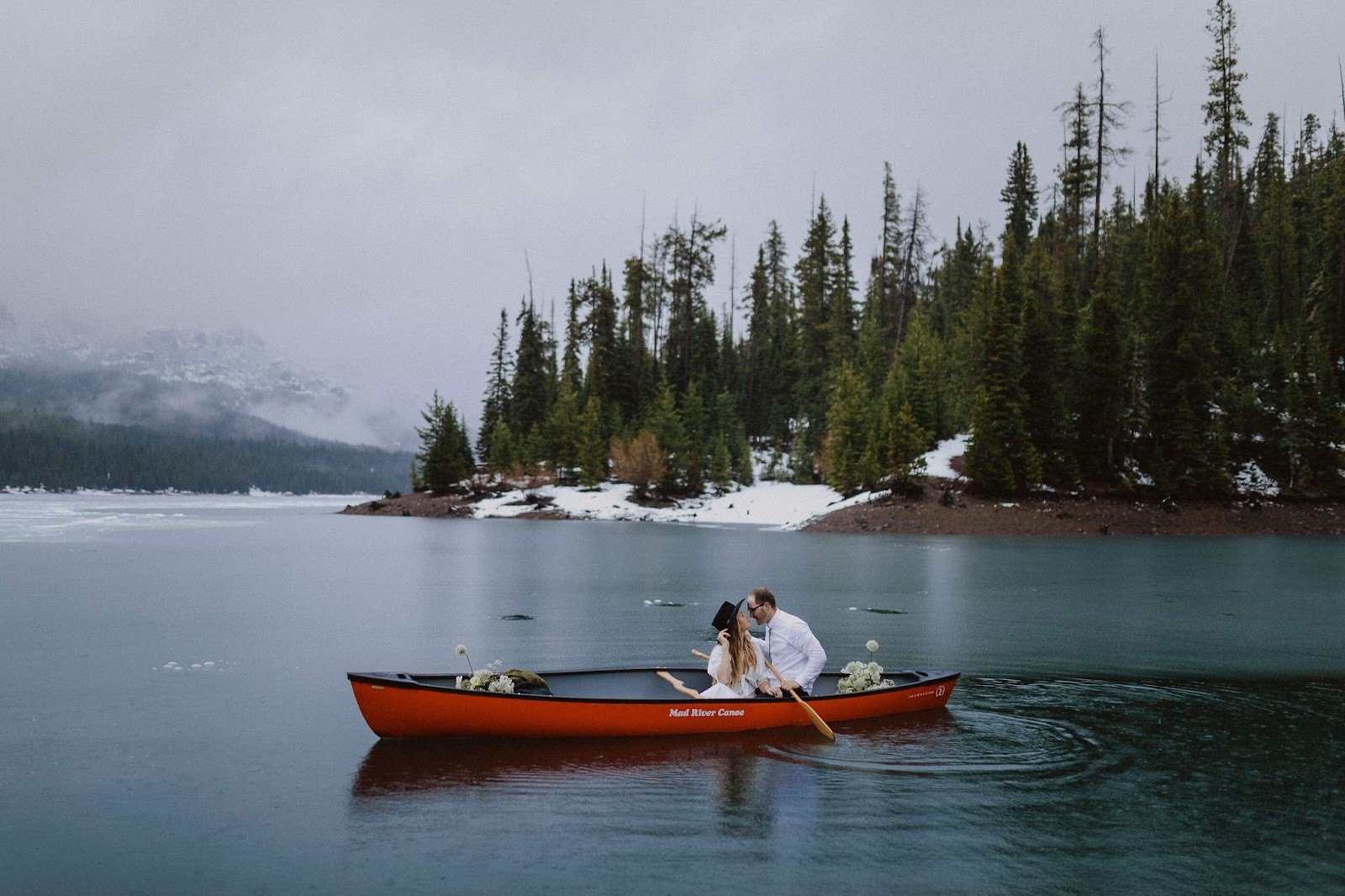 elopement couple in kayak - how to make an elopement special